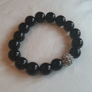 Black beaded bracelet with crystal accent